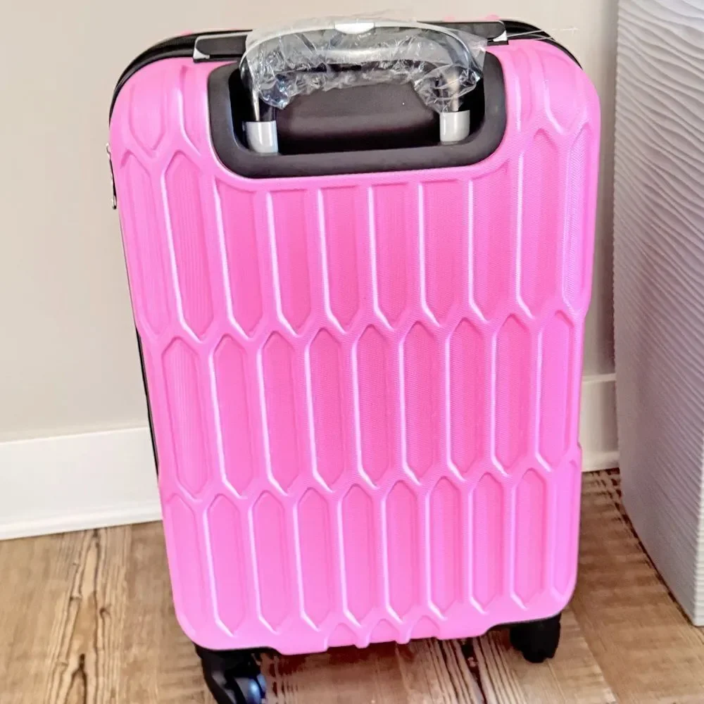 AMKA Honeycomb 20 in. Carry-On Expandable Spinner Suitcase luggage pink